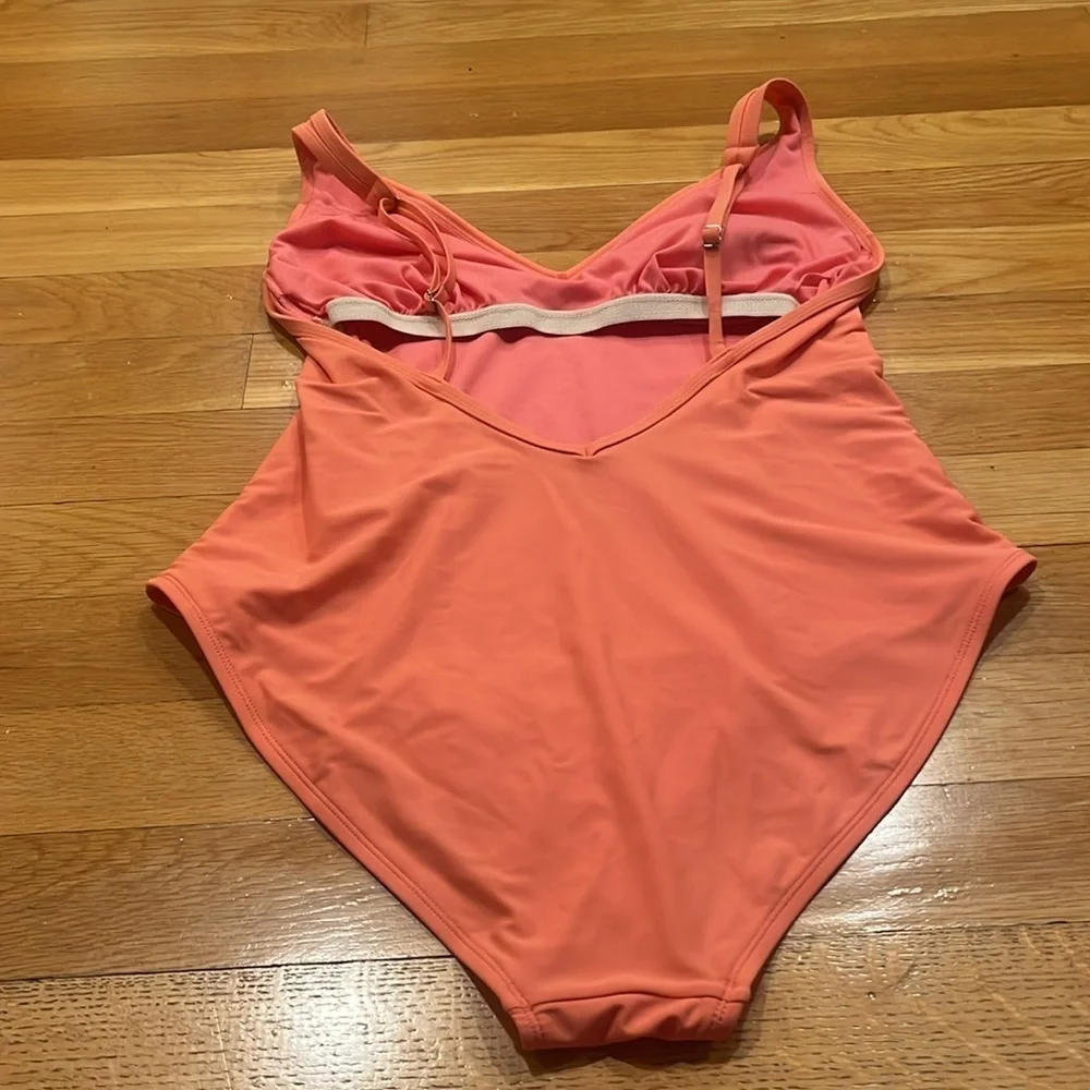 Kona sol women’s peach color vneck one piece swimsuit size xlarge.
